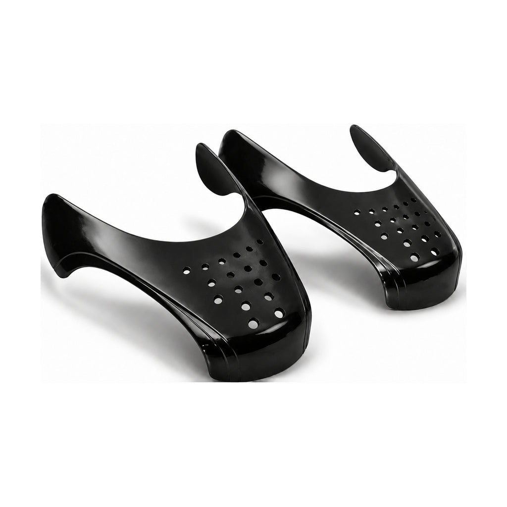 A pair of Ultimate Armor Shields crease protectors in black, showing the patent-pending Double Notch Design and ventilation holes