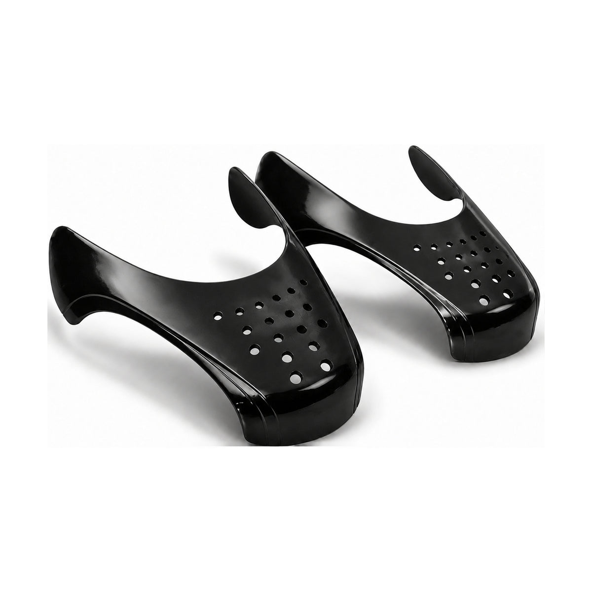 A pair of Ultimate Armor Shields crease protectors in black, showing the patent-pending Double Notch Design and ventilation holes